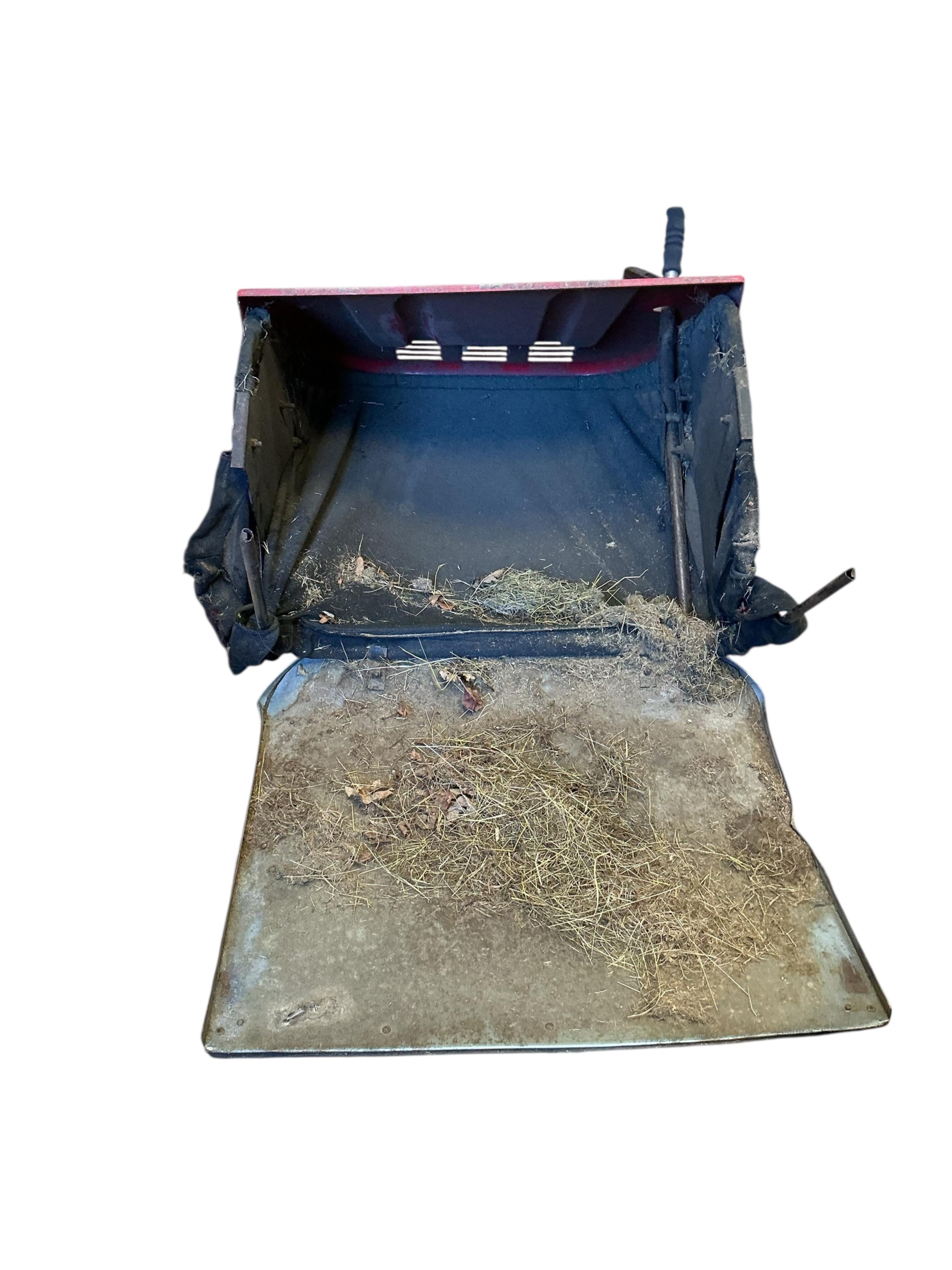 A Westwood S1300 ride on mower with scarifier and brass box attachments